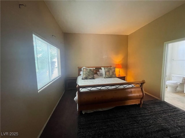 1667 Marion Bennet Dr, Las Vegas, NV 89106 - bedroom with carpet, baseboards, and ensuite bath