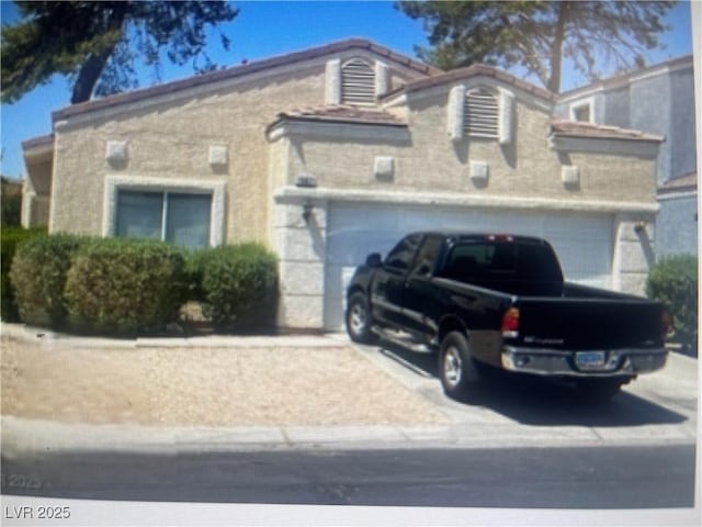 1667 Marion Bennet Dr, Las Vegas, NV 89106 - view of front of property featuring driveway