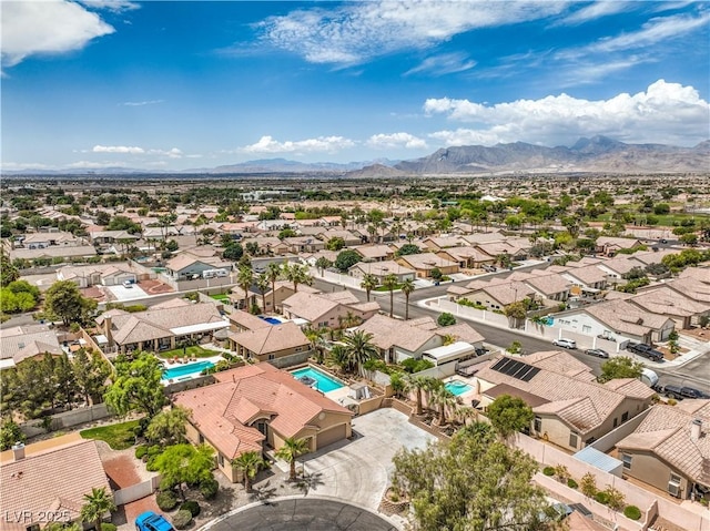 7427 Page Ranch Ct, Las Vegas, NV 89131 - aerial perspective of suburban area featuring a mountainous background and a pool