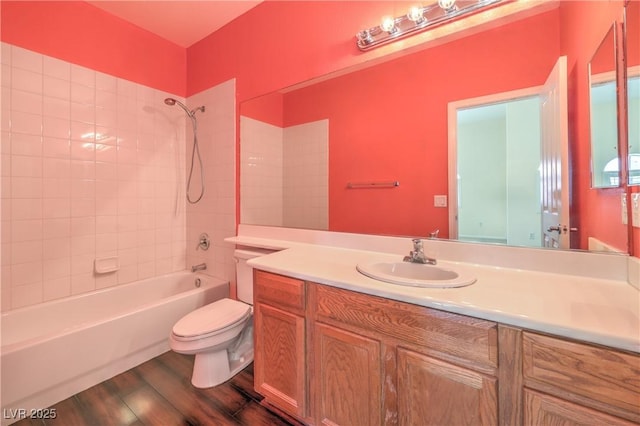 7427 Page Ranch Ct, Las Vegas, NV 89131 - bathroom with vanity, toilet, tub / shower combination, and wood finished floors