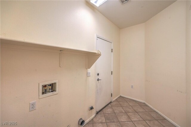 7427 Page Ranch Ct, Las Vegas, NV 89131 - laundry room featuring hookup for a washing machine, light tile patterned flooring, hookup for a gas dryer, and baseboards