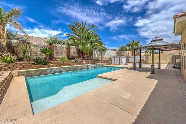 7427 Page Ranch Ct, Las Vegas, NV 89131 - view of pool featuring a gazebo, a patio, and a fenced backyard