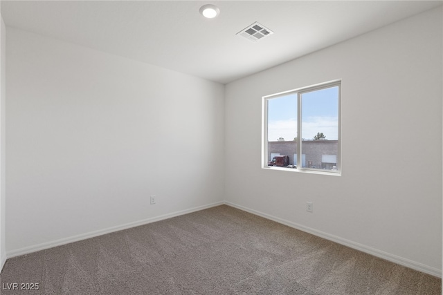 6252 Blood Lily Ave, Las Vegas, NV 89122 - empty room with carpet floors and baseboards