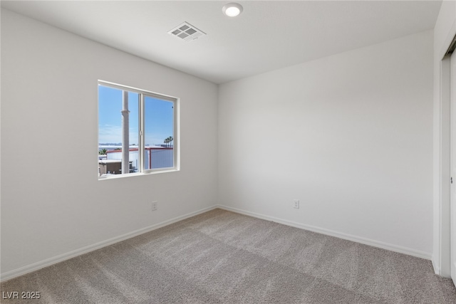 6252 Blood Lily Ave, Las Vegas, NV 89122 - empty room with carpet floors and baseboards