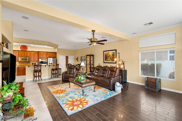 5940 Vizzi Ct, Las Vegas, NV 89131 - living area with ceiling fan, healthy amount of natural light, baseboards, ornamental molding, and wood finished floors