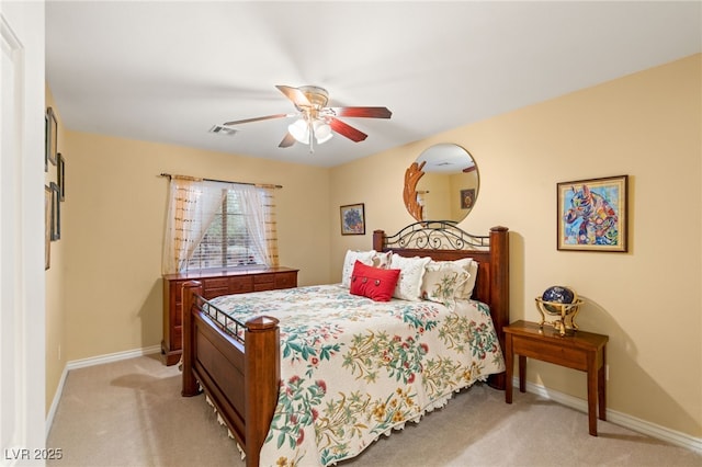 5940 Vizzi Ct, Las Vegas, NV 89131 - bedroom with light carpet, baseboards, and a ceiling fan