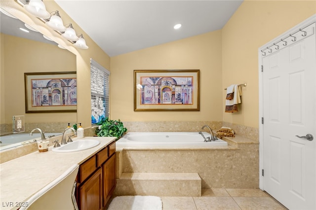5940 Vizzi Ct, Las Vegas, NV 89131 - full bath with vanity, tile patterned floors, a garden tub, vaulted ceiling, and recessed lighting