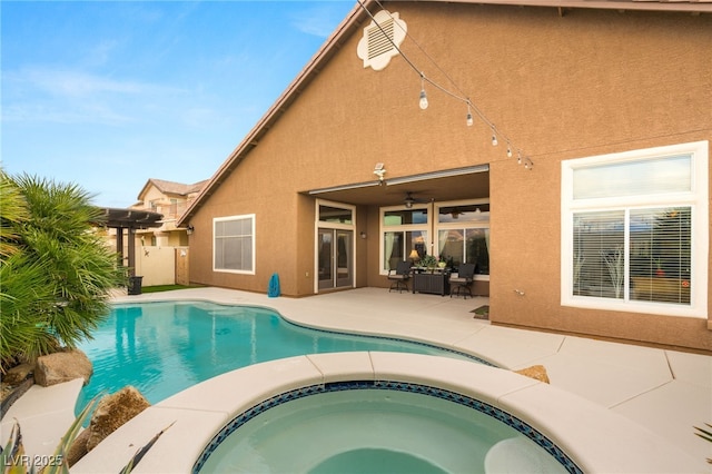 5940 Vizzi Ct, Las Vegas, NV 89131 - swimming pool with an in-ground hot tub and a patio