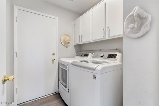 3157 Capetown Way, Las Vegas, NV 89128 - laundry room with independent washer and dryer, cabinet space, and wood finished floors