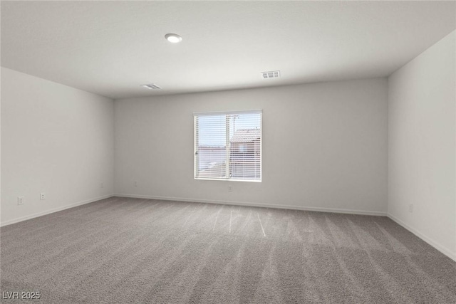 6197 Blood Lily Ave, Las Vegas, NV 89122 - spare room with carpet flooring and baseboards