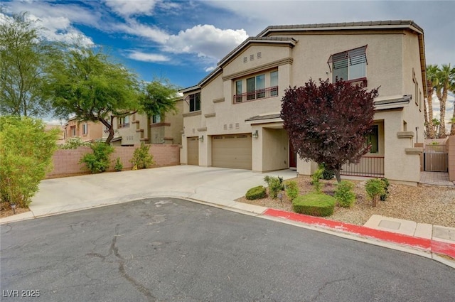 8223 Saddleback Ledge Ave, Las Vegas, NV 89147 - view of front facade featuring an attached garage, driveway, and stucco siding