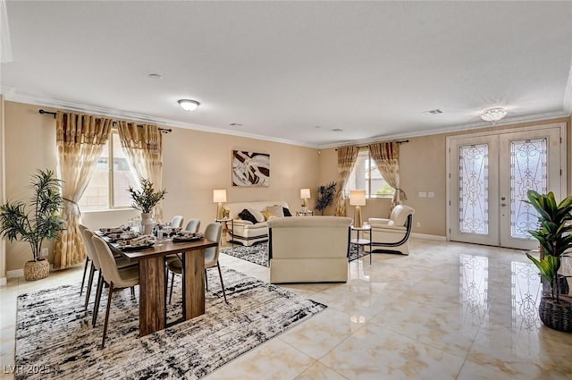 8223 Saddleback Ledge Ave, Las Vegas, NV 89147 - living area featuring ornamental molding, french doors, and baseboards