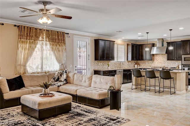 8223 Saddleback Ledge Ave, Las Vegas, NV 89147 - living area featuring ceiling fan, crown molding, and light marble finish floors