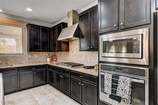 8223 Saddleback Ledge Ave, Las Vegas, NV 89147 - kitchen with appliances with stainless steel finishes, wall chimney exhaust hood, a sink, ornamental molding, and backsplash