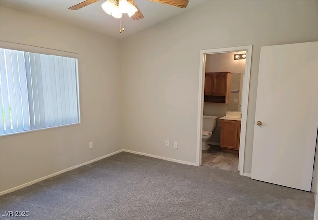 4718 Victoria Garden Ave, North Las Vegas, NV 89031 - unfurnished bedroom featuring carpet flooring, baseboards, ensuite bath, and a ceiling fan