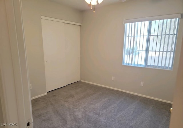 4718 Victoria Garden Ave, North Las Vegas, NV 89031 - unfurnished bedroom with carpet, baseboards, and a closet