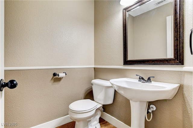 3717 Shanagolden St, Las Vegas, NV 89129 - bathroom featuring toilet and a textured wall