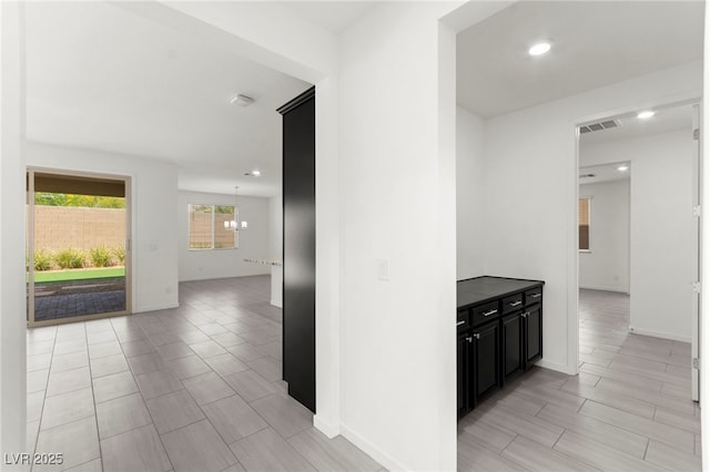 767 Tallgrass St, Las Vegas, NV 89138 - hall with baseboards, recessed lighting, and a chandelier