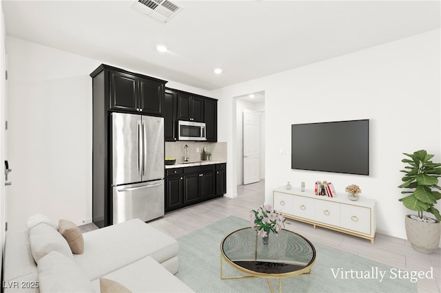 767 Tallgrass St, Las Vegas, NV 89138 - living area with recessed lighting and light wood-style flooring
