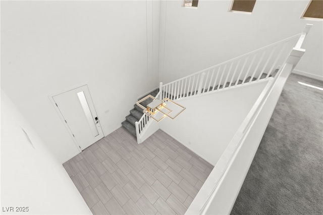 767 Tallgrass St, Las Vegas, NV 89138 - stairway featuring a towering ceiling
