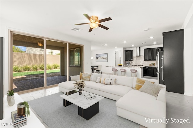 767 Tallgrass St, Las Vegas, NV 89138 - living area featuring a ceiling fan, recessed lighting, and light tile patterned flooring
