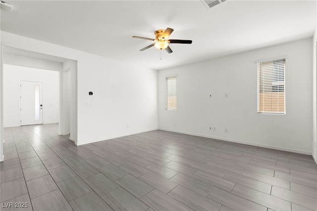 767 Tallgrass St, Las Vegas, NV 89138 - spare room with a ceiling fan and baseboards