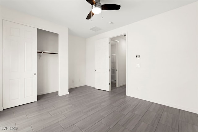 767 Tallgrass St, Las Vegas, NV 89138 - unfurnished bedroom with baseboards, wood finished floors, a closet, and ceiling fan