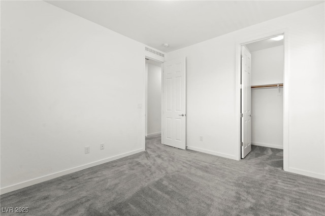 767 Tallgrass St, Las Vegas, NV 89138 - unfurnished bedroom with carpet, baseboards, and a spacious closet