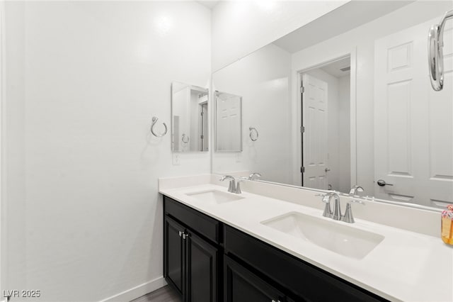767 Tallgrass St, Las Vegas, NV 89138 - full bath featuring double vanity, baseboards, and wood finished floors
