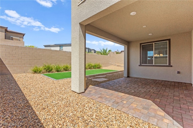 767 Tallgrass St, Las Vegas, NV 89138 - fenced backyard featuring a patio area