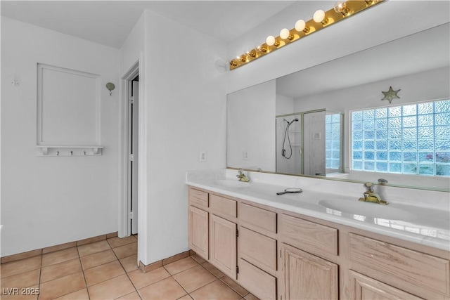 6405 Break Point Ave, Las Vegas, NV 89130 - full bathroom with a shower stall, double vanity, and tile patterned flooring