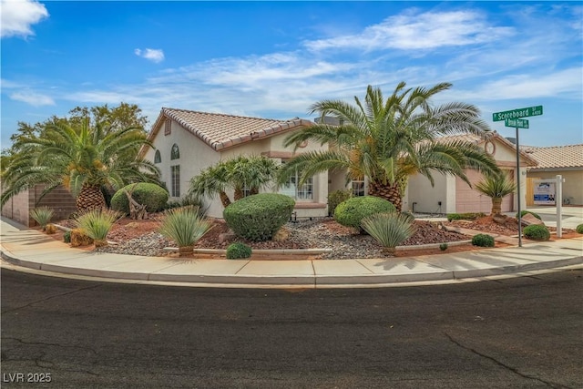 6405 Break Point Ave, Las Vegas, NV 89130 - mediterranean / spanish home with stucco siding and a tile roof