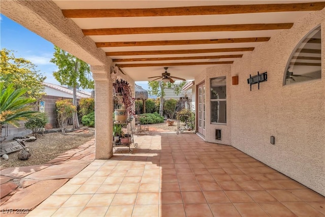 6405 Break Point Ave, Las Vegas, NV 89130 - fenced backyard with a ceiling fan and a patio area
