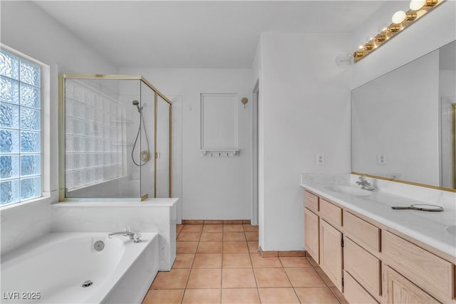 6405 Break Point Ave, Las Vegas, NV 89130 - full bath featuring a stall shower, double vanity, a bath, and tile patterned floors
