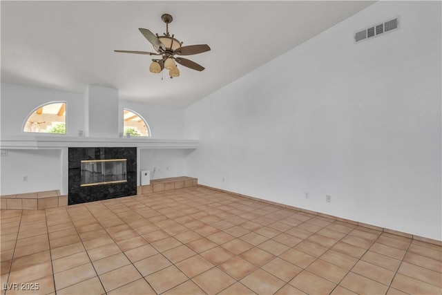 6405 Break Point Ave, Las Vegas, NV 89130 - unfurnished living room with vaulted ceiling, ceiling fan, and a premium fireplace