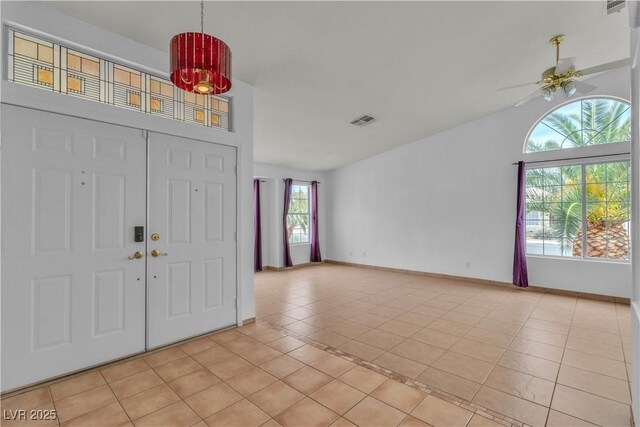 6405 Break Point Ave, Las Vegas, NV 89130 - entrance foyer featuring light tile patterned floors, a ceiling fan, and baseboards