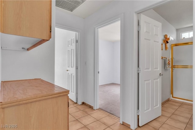 6405 Break Point Ave, Las Vegas, NV 89130 - corridor featuring light tile patterned floors and baseboards