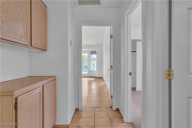 6405 Break Point Ave, Las Vegas, NV 89130 - corridor with light tile patterned flooring and baseboards