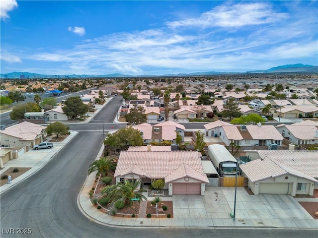 6405 Break Point Ave, Las Vegas, NV 89130 - aerial perspective of suburban area with a mountainous background