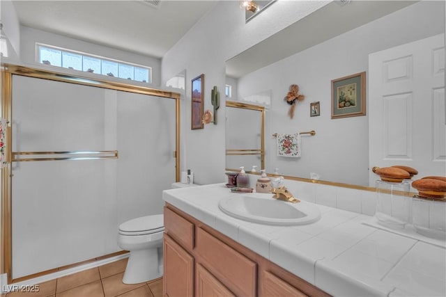 6405 Break Point Ave, Las Vegas, NV 89130 - bathroom with vanity, a shower stall, toilet, and tile patterned floors