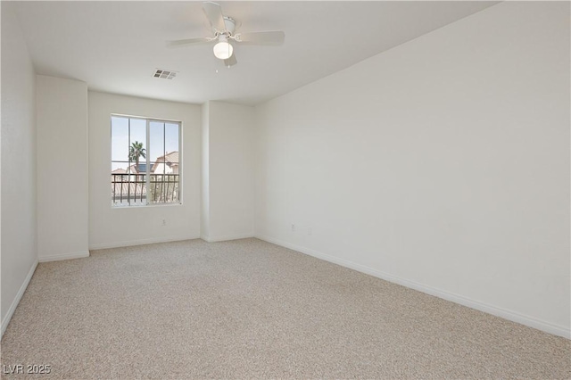 8224 Cassis Ct, Las Vegas, NV 89117 - empty room with light colored carpet, baseboards, and a ceiling fan