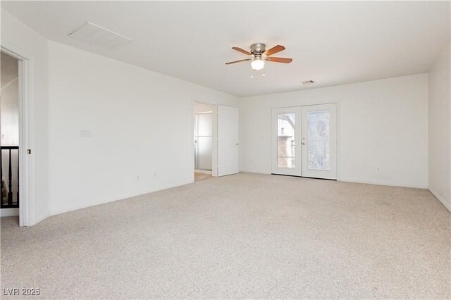 8224 Cassis Ct, Las Vegas, NV 89117 - empty room featuring light colored carpet, a ceiling fan, and french doors