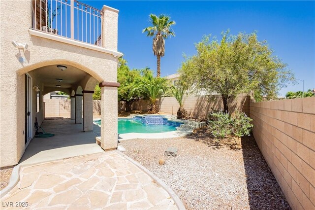 8224 Cassis Ct, Las Vegas, NV 89117 - view of swimming pool with a fenced backyard and a patio