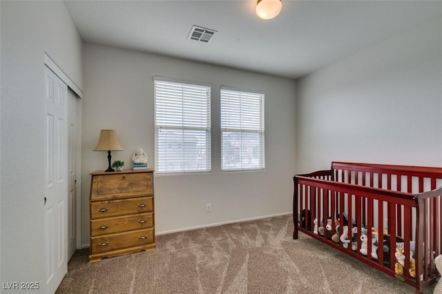 1370 Crystal Hill Ln Unit 3, Henderson, NV 89012 - carpeted bedroom featuring a closet and a crib