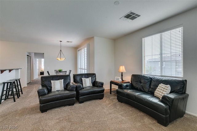 1370 Crystal Hill Ln Unit 3, Henderson, NV 89012 - living area with light colored carpet and healthy amount of natural light