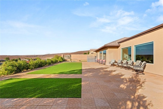 20 Kittansett Loop, Henderson, NV 89052 - view of yard featuring a patio