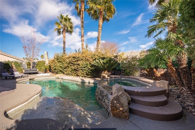 340 Autumn Palace Ct, Las Vegas, NV 89144 - view of pool with a patio area, a fenced backyard, and a pool with connected hot tub