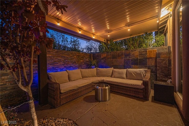340 Autumn Palace Ct, Las Vegas, NV 89144 - fenced backyard with an outdoor hangout area and a patio
