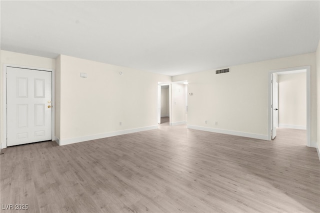 7566 Glowing Ember Ct Unit 101, Las Vegas, NV 89130 - empty room featuring light wood-type flooring and baseboards
