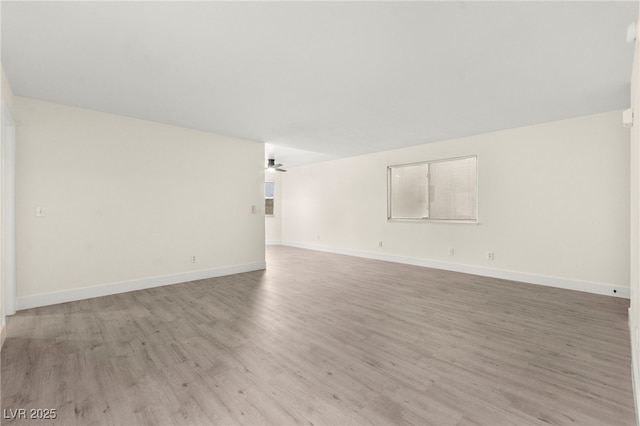 7566 Glowing Ember Ct Unit 101, Las Vegas, NV 89130 - empty room featuring light wood finished floors and baseboards